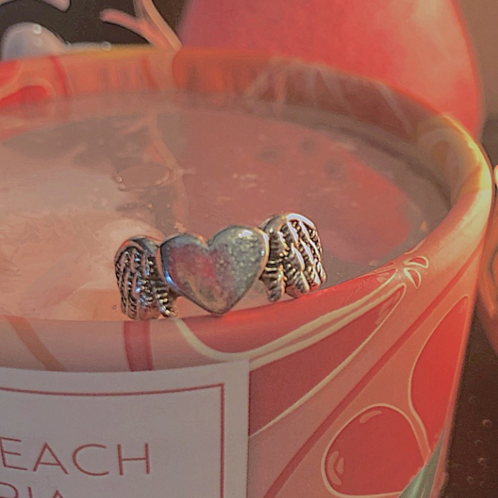 Heart with wings ring